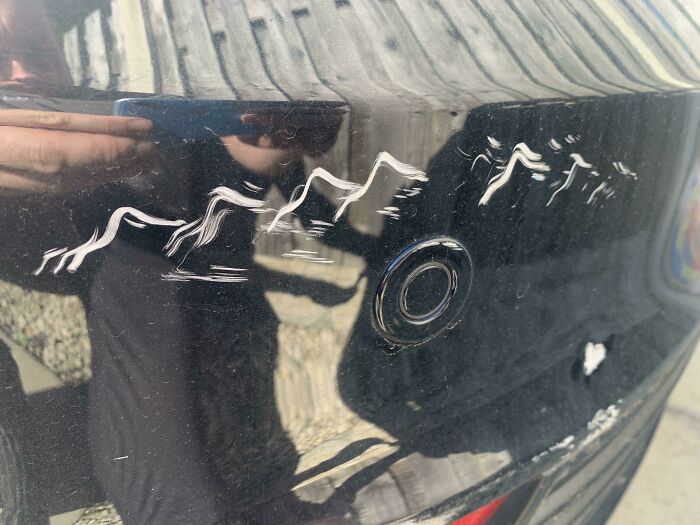 I Reversed My Car Into A Rock And The Damage Looks Like A Hand-Painted Mountain Range
