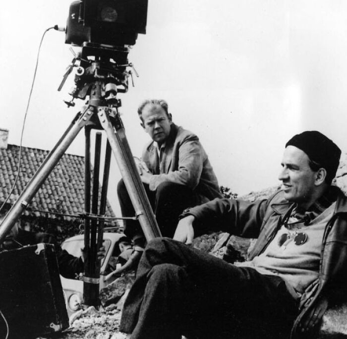 Ingmar Bergman sitting behind a camera on set, illustrating famous people who got married multiple times in film history.