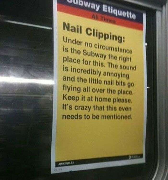 Yellow subway etiquette sign in New York warning against nail clipping due to noise and mess on the subway.