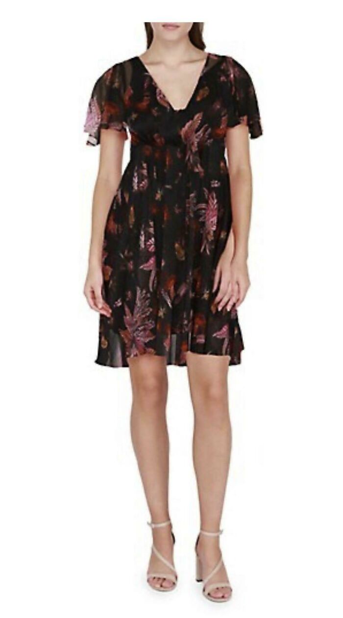 Is She Holding Someone’s Hand?