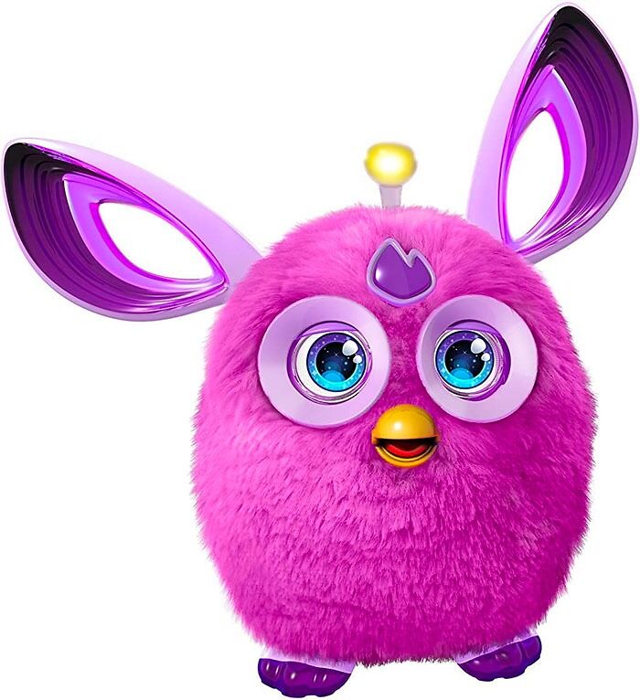 Pink Furby toy with large blue eyes and purple ears, a nostalgic big trend from past years making a comeback.
