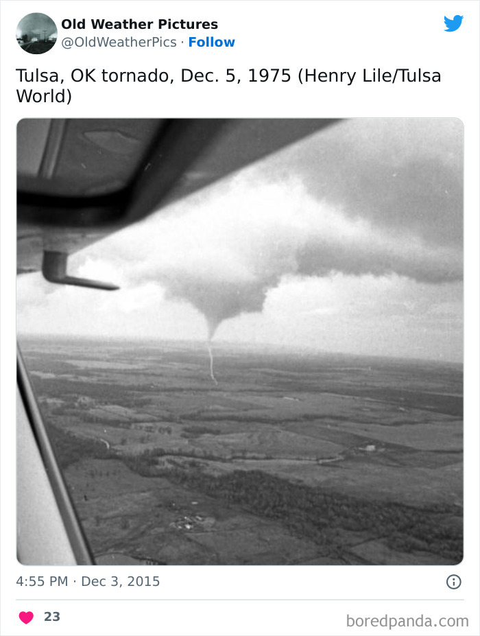 Tornado over rural landscape in Oklahoma captured from an aircraft window showing extreme and crazy weather example.