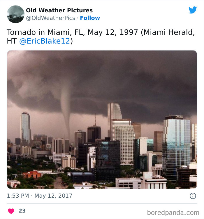 Tornado touching down in Miami skyline with dark storm clouds, showcasing extreme and crazy weather examples.