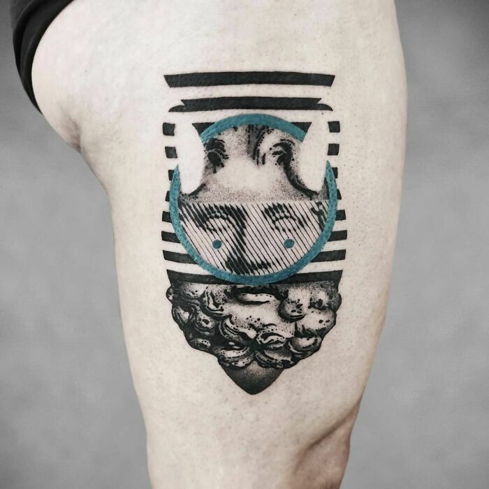 Optical illusion tattoo featuring a mind-bending, layered design with abstract elements on a person's leg.