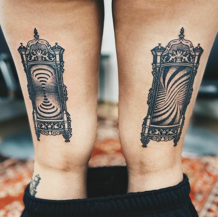 Optical illusion tattoos on legs featuring ornate frames with mesmerizing patterns.