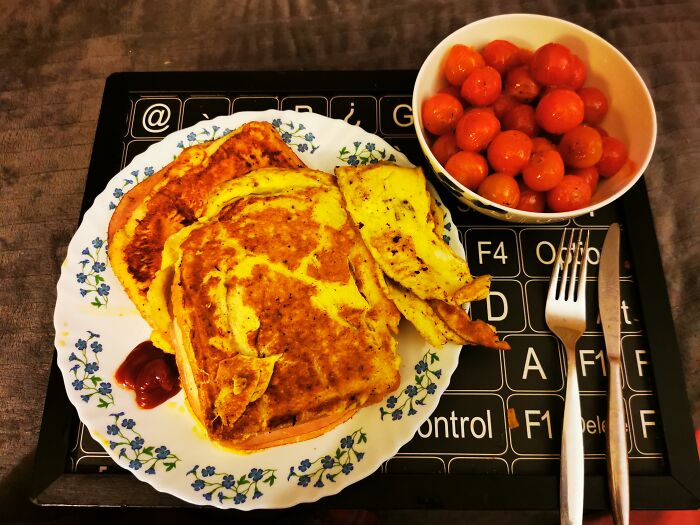 A Monte Cristo Sandwich And Pan Fried Tomatoes