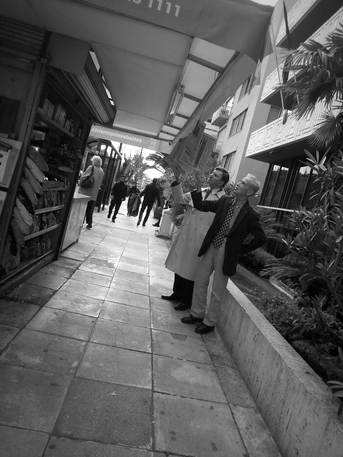 Two Old Guys Reading The News