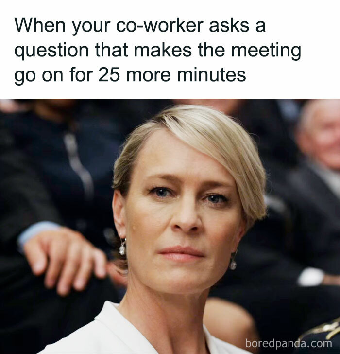 Serious woman reacting to a co-worker extending a meeting, embodying work week memes' humor.