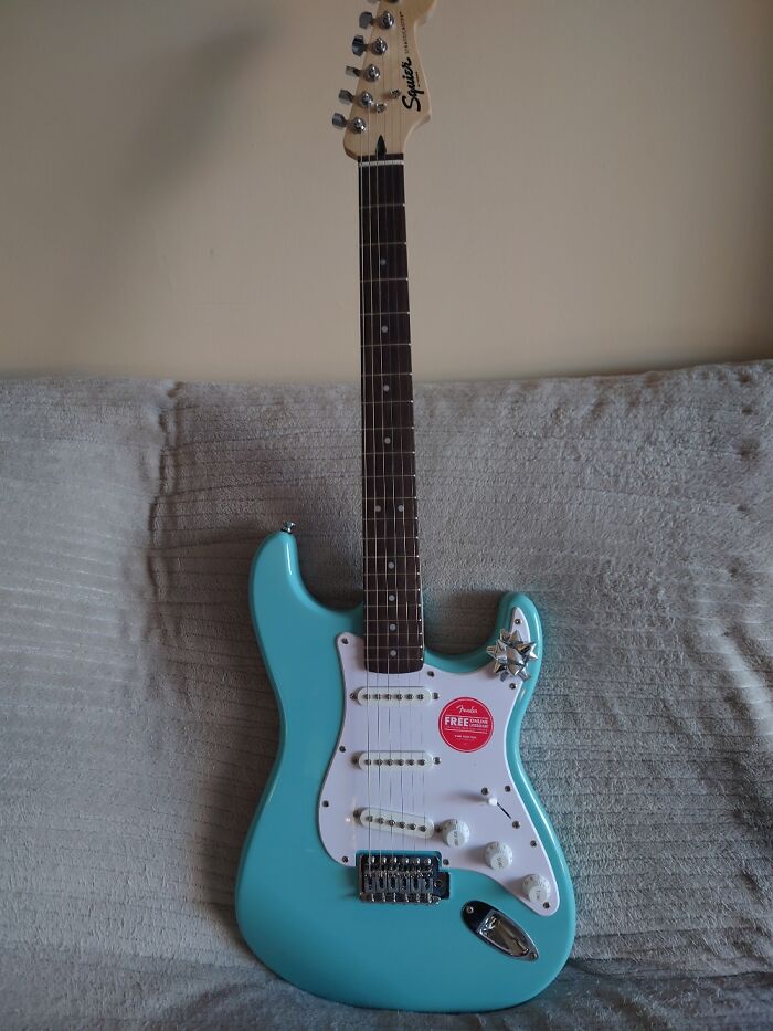 A Guitar From My Son And He Got One From Us