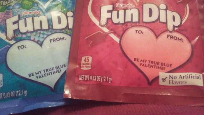 Both The Blue And Red Packets Say True Blue Valentine