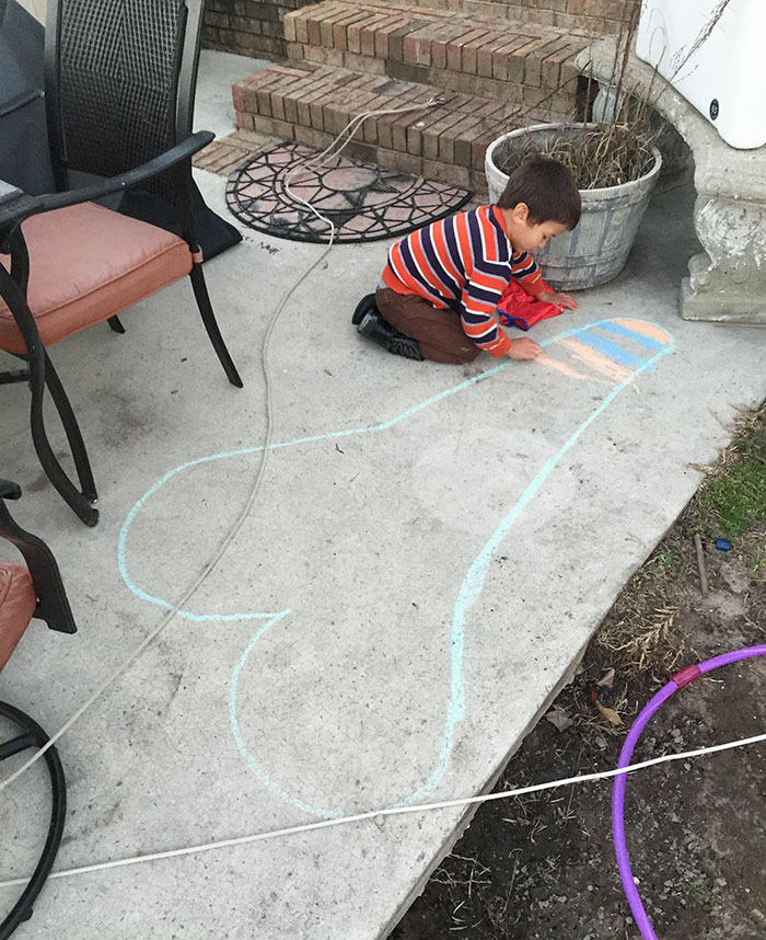 My Nephew Drawing Valentine's "Hearts" On The Patio