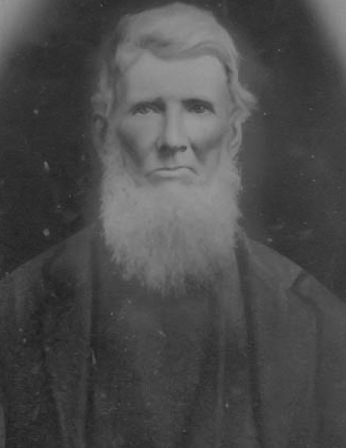 Black and white picture of Johnny Appleseed posing