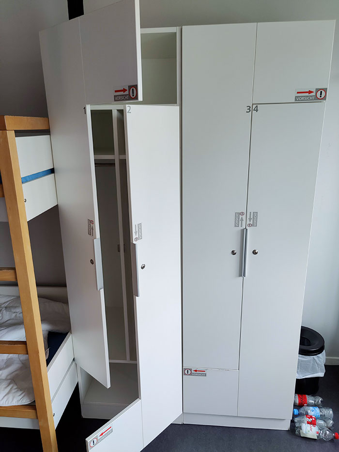 This Closet In A German Hotel Needs Several Warnings. I Almost Hit My Head