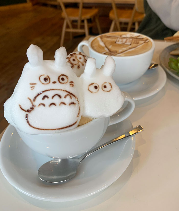 3D foam art of Totoro characters in a coffee cup showcasing unique Japanese inventions in cafe culture.