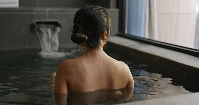 Woman enjoy onsen