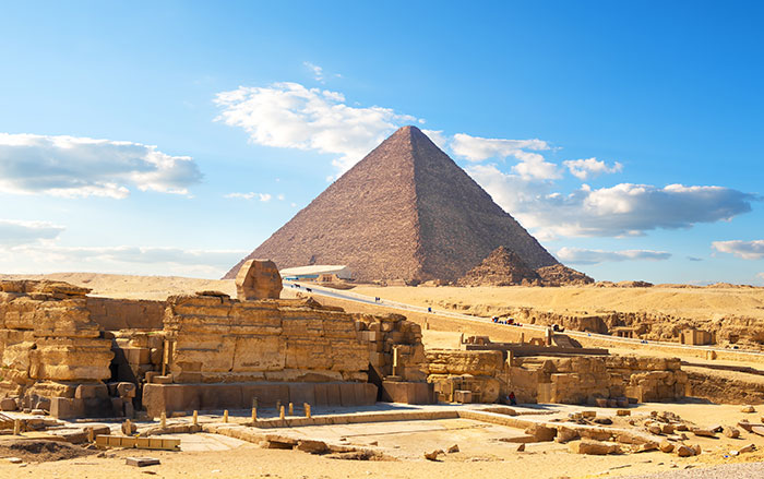 Egyptian pyramids in sand desert and clear sky
