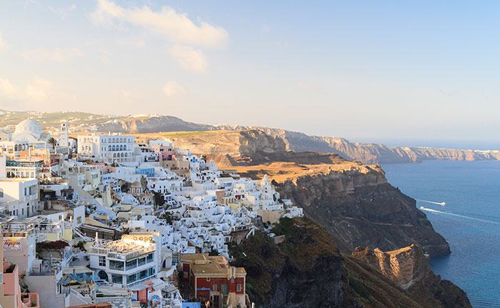 Fira town on Santorini hanging on cliffs edge