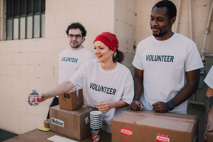 Volunteers Giving Water Away 