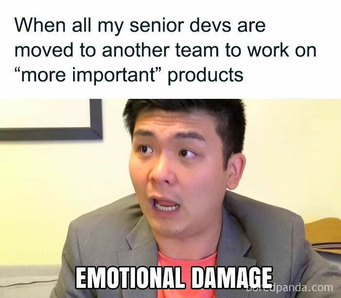 Man in a suit expressing frustration about senior devs moving teams, illustrating product manager problems at work.