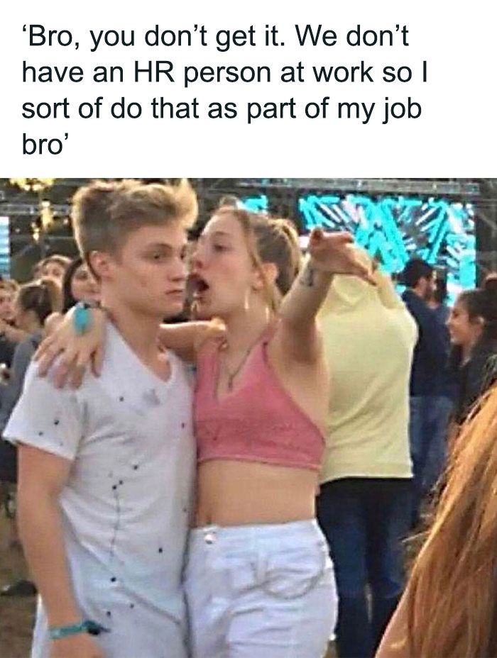 Woman animatedly explains something to a guy at an outdoor event, captioned with a humorous HR meme.