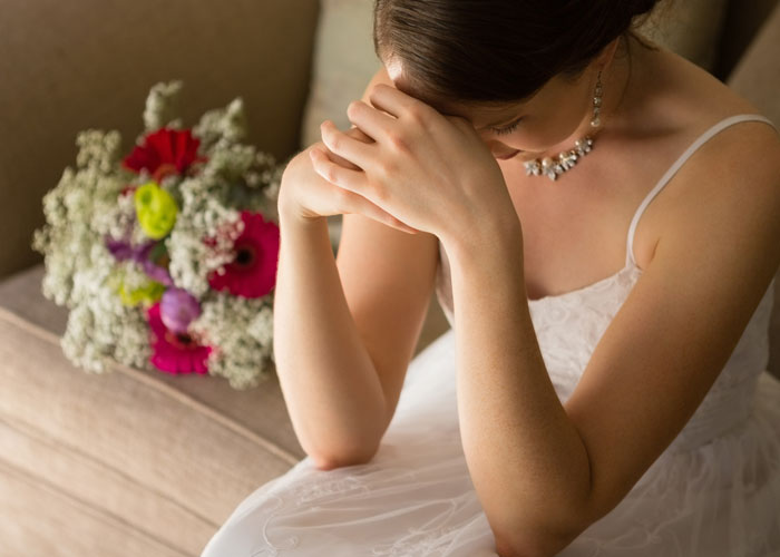 Woman Leaves "Friend's" Wedding After She's Called Out For Not Covering Up Her Skin Condition