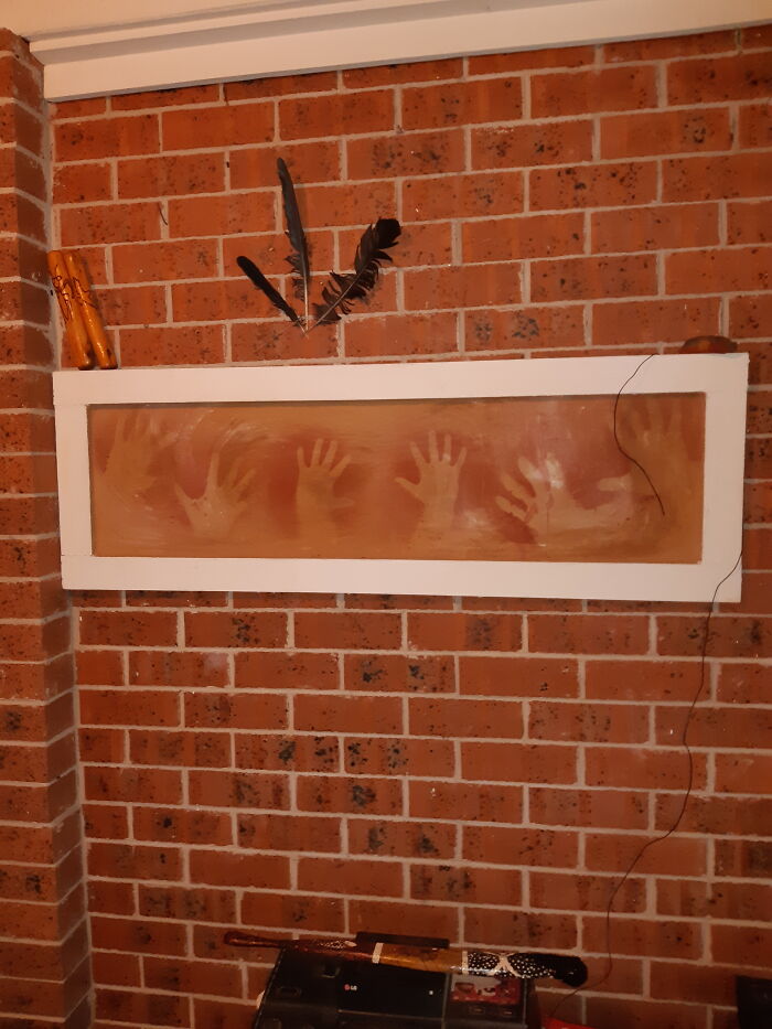 Family Portrait. Render And Oxide Made To Look Like Sandstone Then My Daughter, Partner And Myself Sprayed Ochre Over Our Hands On The Rock