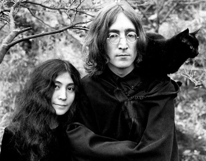 One Of The Most Influential Couples Of The 20th Century, Japanese Activist Yoko Ono And British Singer John Lennon Were Photographed With This Sleek Black Cat. Surrey, England. 1968