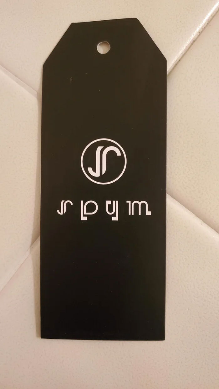 The Logo On My Jacket's Tag... How Am I Supposed To Read This?