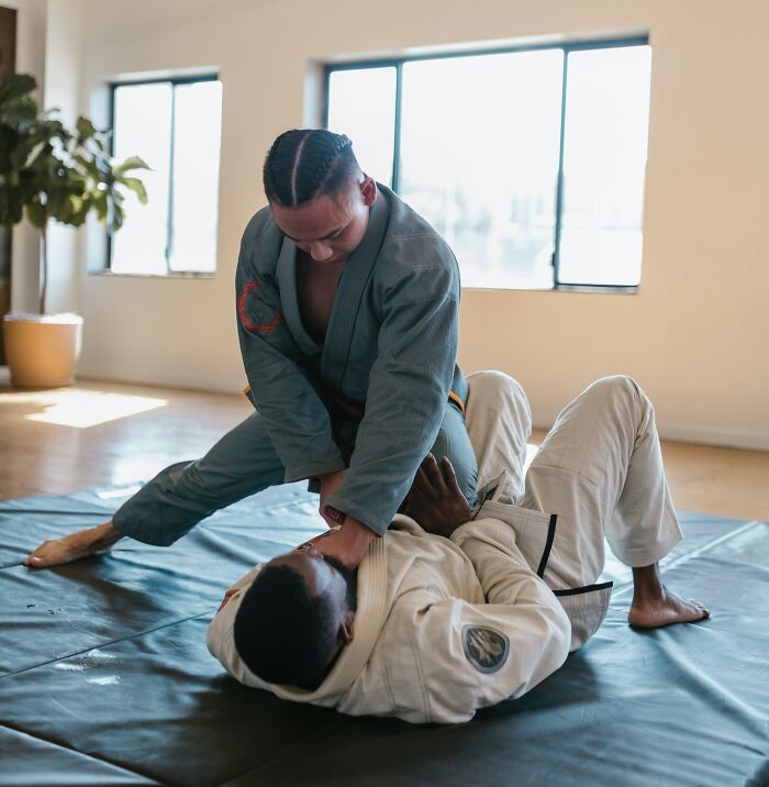 Men Practicing Self Defense On Each Other 