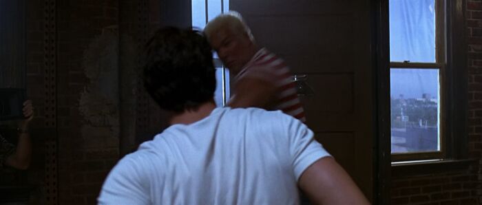 In The Punisher (2004) Just As "The Russian" Breaks Through Frank Castle's Door, You Can See A Camera Man Standing Off To The Left