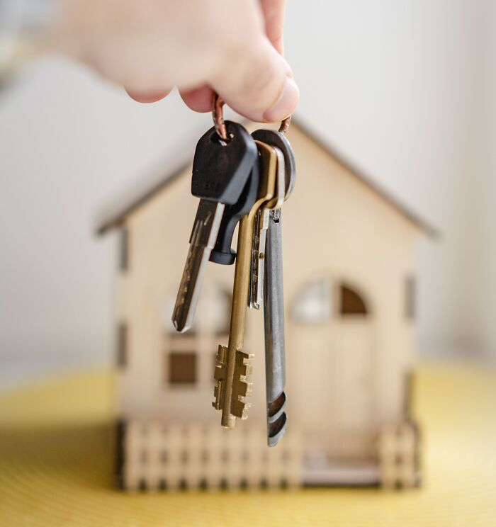 Person Holding His House Keys 