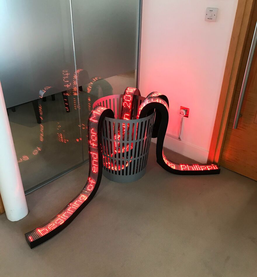 A Piece Of Art At The Office - Displays The Live Ticker Tape Headlines, Thrown Into The Trash