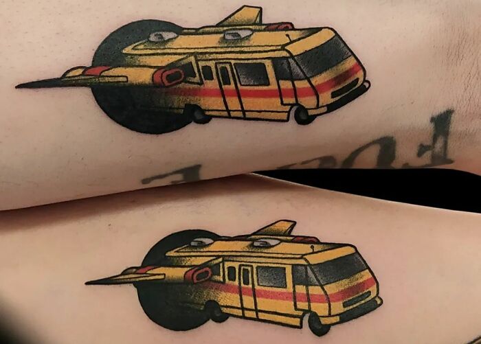 Matching brother and sister tattoos of a colorful camper van.