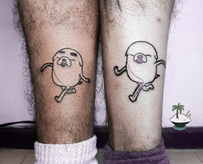 Brother and sister tattoos featuring playful matching characters on their legs.