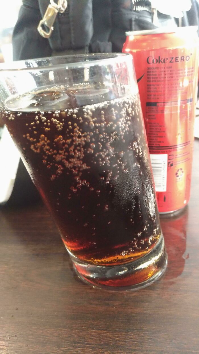 All The Drinking Glasses In This Restaurant Are Slanted