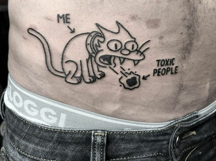 Funny Simpsons cat tattoo of a cartoon cat puking labeled "toxic people" on a person's side.
