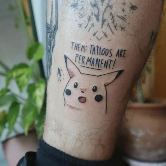 Funny tattoo of surprised Pikachu with text about tattoos being permanent.