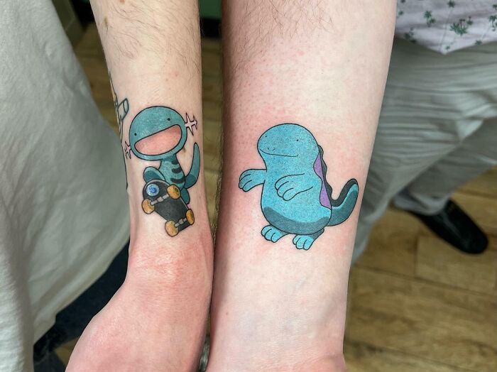 Colorful best friend tattoos featuring cartoon characters on two forearms.