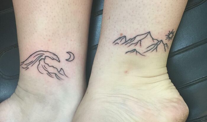 Best friend tattoos depicting ocean waves and mountains on ankles.
