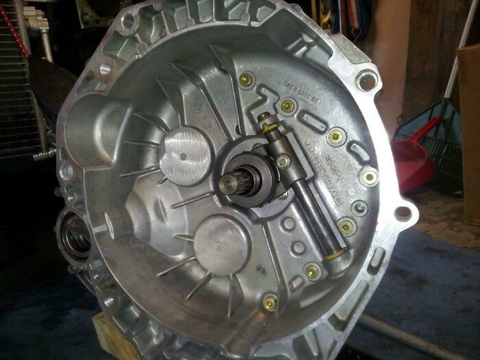 My Dad Spent Several Weeks Changing The Clutch On His 2003 Mini Cooper S Jcw. He Doesn't Trust The Dealer To Do It Properly. This Is What The Bell Housing Looked Like Before It Went Back On