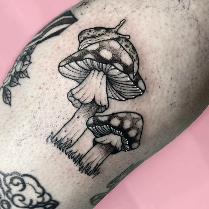 Mushroom tattoo design celebrating the human-earth bond with nature.