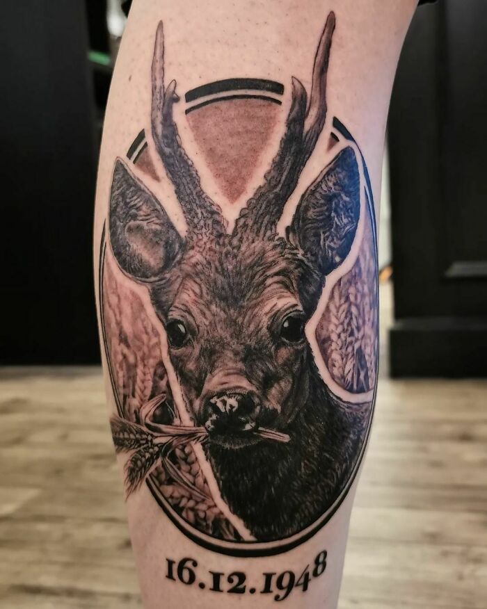 Deer tattoo with intricate nature details, illustrating the wonders of Mother Earth.