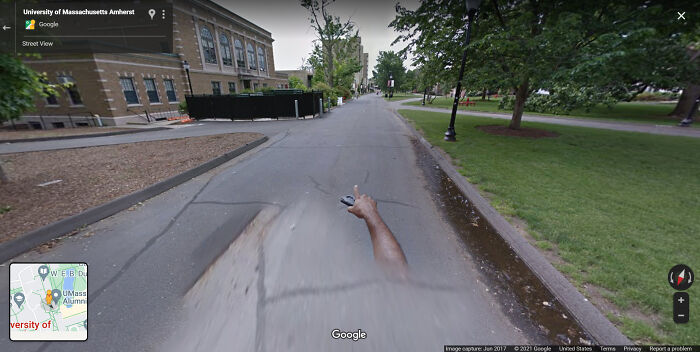 Random Hand Pointing The Way On Campus