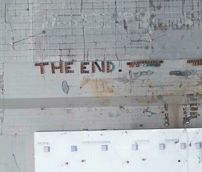 “The End!” Spelled Out In Shipping Crates Next To The Rivian Car Manufacturing Plant In Normal, Il. (40.5140640, -89.0546155)