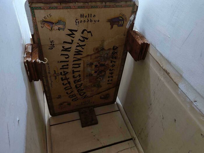 This Shelf In The Closet Of Our New Home Was An Upside Down, Wooden Ouija Board