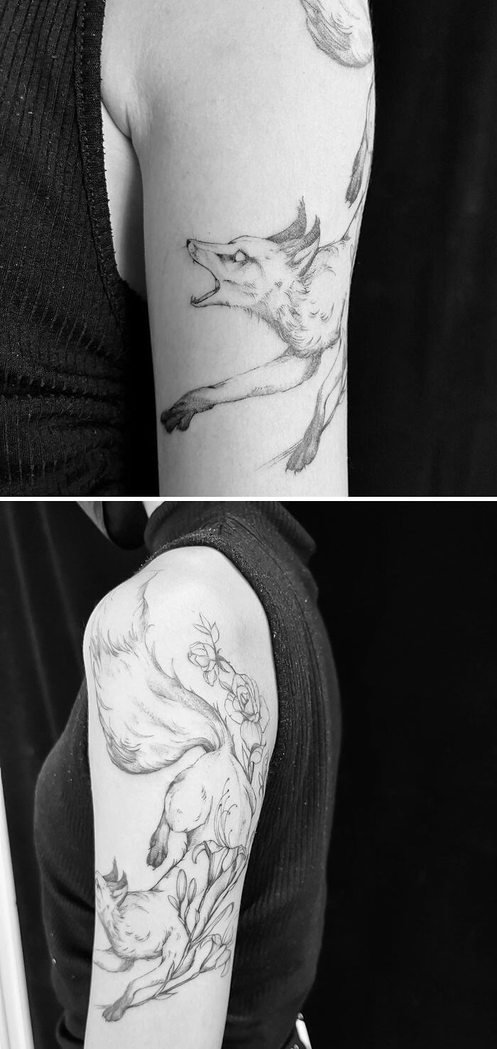 Fox-inspired animal tattoo on person's arm, showcasing detailed black ink design.