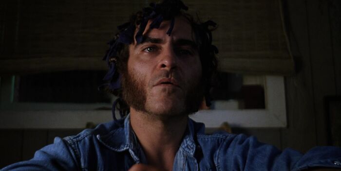 Doc Sportello wearing jeans shirt 