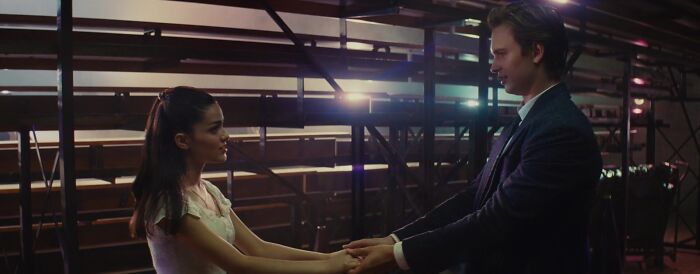 Maria and Tony holding hands 