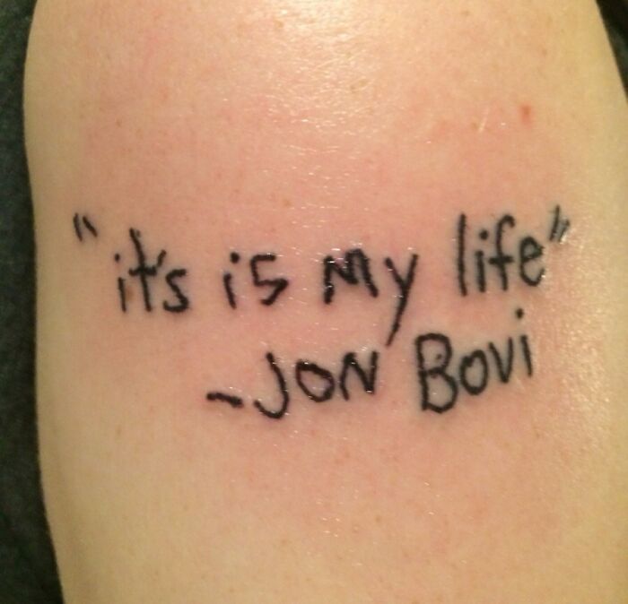 Funny tattoo with misspelled phrase "it's is my life" attributed to Jon Bovi.