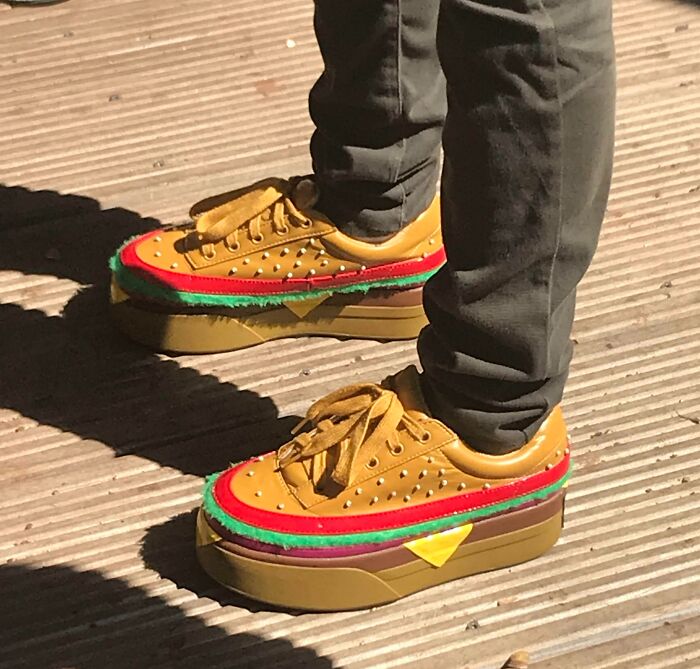 Colorful platform sneakers with studs, showcasing a unique and weird shoe design.